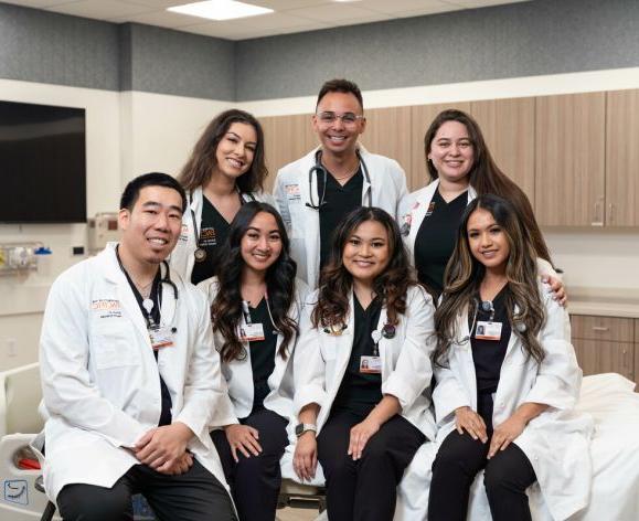 nursing students in white coats